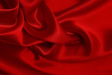 Koyu kırmızı kumaş dokusu arka plan, ipeğin veya keten deseninin ayrıntıları.