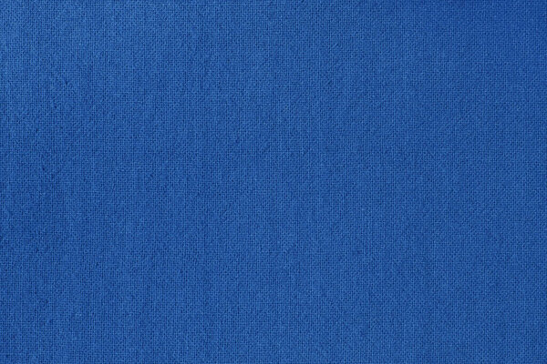 Dark blue cotton fabric cloth texture for background, natural textile pattern.