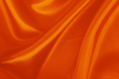 Turuncu kumaş dokusu arkaplanı, ipeğin veya keten deseninin ayrıntıları.