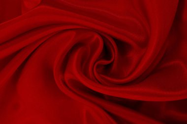 Koyu kırmızı kumaş dokusu arka plan, ipeğin veya keten deseninin ayrıntıları.