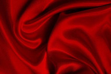 Koyu kırmızı kumaş dokusu arka plan, ipeğin veya keten deseninin ayrıntıları.