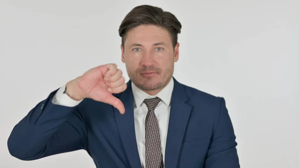 Middle Aged Businessman showing Thumbs Down Gesture, White Background — Stock Photo, Image