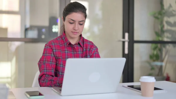 Indian Woman Working on Laptop