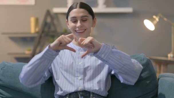 Portrait of Hispanic Woman Making Heart Shape with Hands — Stock Video