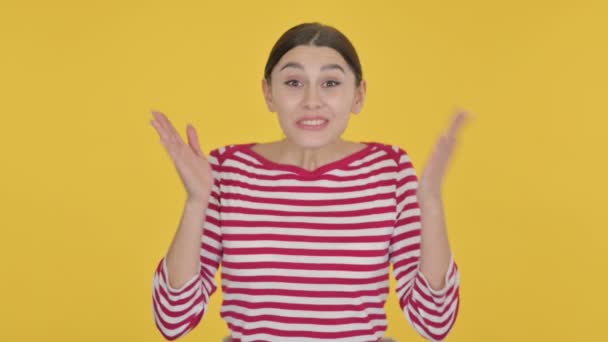 Spanish Woman Feeling Cold on Yellow Background — Stock Video