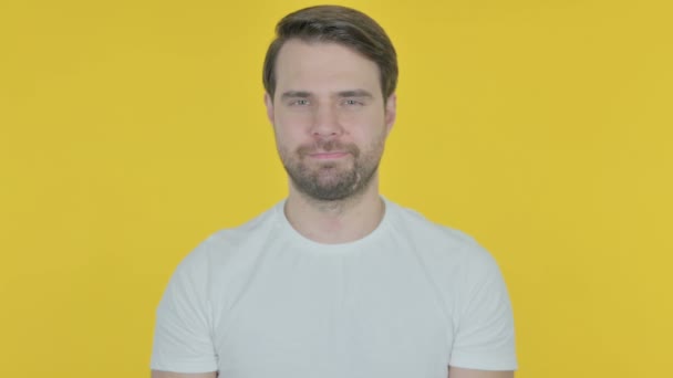 Approval Casual Young Man Shaking Head Yellow Background — Stockvideo