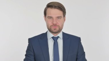 Young Adult Businessman Pointing at the Camera on White Background 