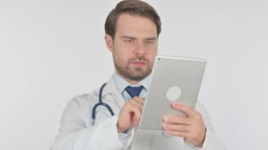Young Adult Doctor using Digital Tablet on White Background 