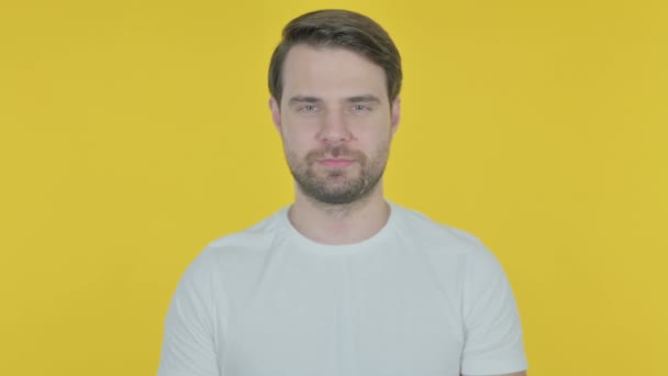 Smiling Casual Young Man Yellow Background — Αρχείο Βίντεο