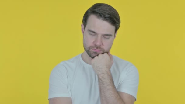 Casual Young Man Sleeping Yellow Background — Stock Video