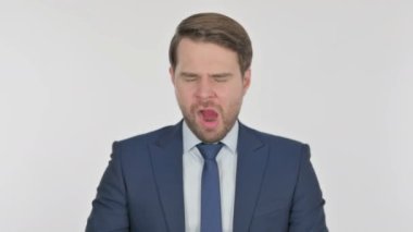 Tired Young Adult Businessman Yawning on White Background 