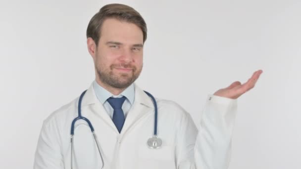 Young Adult Doctor Pointing Side White Background — 图库视频影像