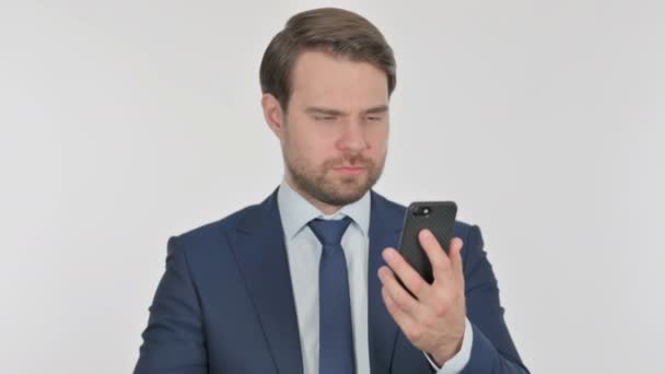 Young Adult Businessman Celebrating Smartphone White Background — Vídeo de stock