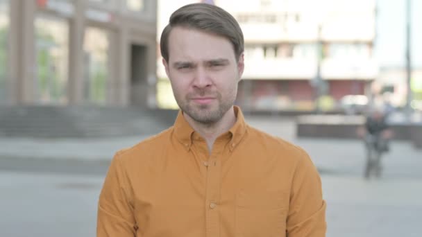 Sad Casual Young Man Crying While Standing Outdoor — Stock videók
