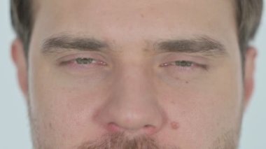 Face of Serious Young Adult Man on White Background 