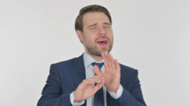 Young Adult Businessman Dancing in Joy on White Background 