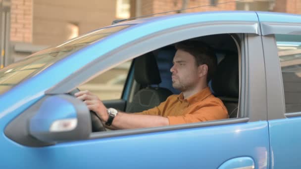 Casual Young Man Looking Camera While Sitting Car — kuvapankkivideo