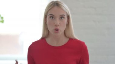Portrait of Angry Young Woman Talking in Camera, Fighting