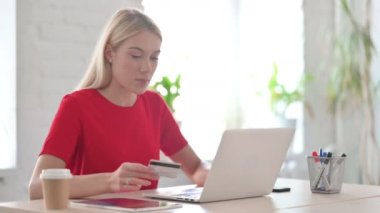 Young Woman Having Online Payment Failure on Laptop in Office 