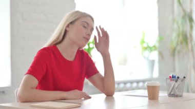 Tense Young Woman having Emotional Stress at Work