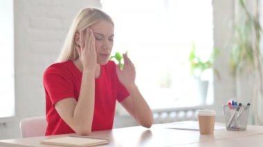 Young Woman having Headache with Emotional Stress