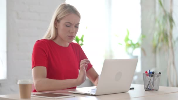 Young Woman Having Wrist Pain While Using Laptop Office — Stock Video