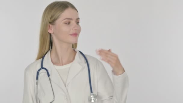 Young Female Doctor Showing Side White Background — Stock videók