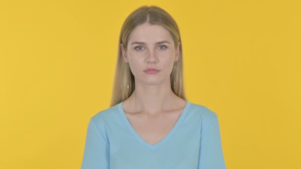 Smiling Casual Young Woman Yellow Background — Wideo stockowe