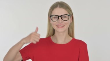 Thumbs Up by Casual Young Woman on White Background 