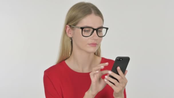 Casual Young Woman Celebrating Smartphone White Background — Stock video