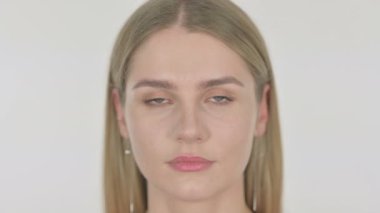 Face of Serious Casual Young Woman on White Background 