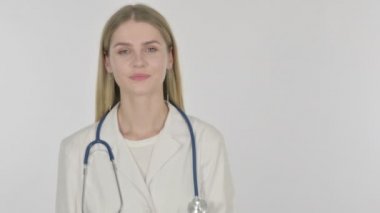 Young Female Doctor Pointing on Side on White Background 