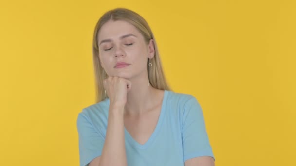 Casual Young Woman Sleeping Yellow Background — Stockvideo