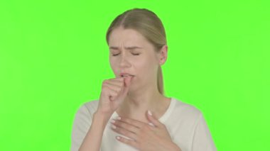 Casual Young Woman having Toothache on Green Background