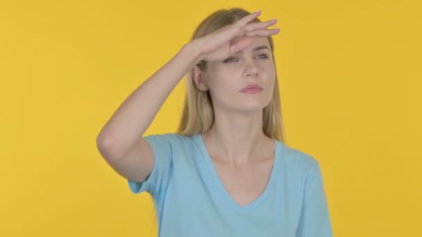 Casual Young Woman Looking Searching Yellow Background — Stock Video