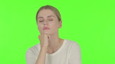 Casual Young Woman Coughing on Green Background 