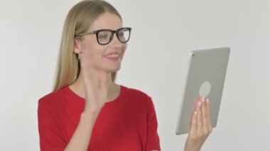 Video Call on Tablet by Casual Young Woman on White Background 