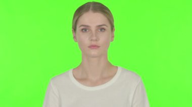 Casual Young Woman Talking on Video Call on Green Background 