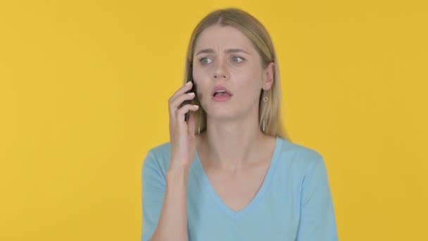 Casual Young Woman Talking Angry Phone Yellow Background — Stockvideo