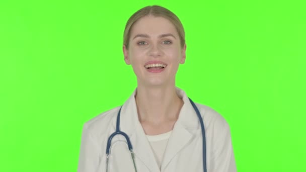 Young Female Doctor Talking Online Video Call Green Background — Stockvideo