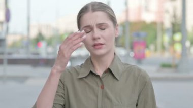 Portrait of Disappointed Young Woman Reacting to Loss Outdoor