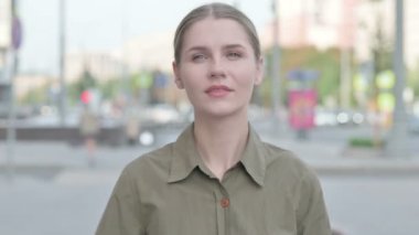 Young Woman Looking Around for Opportunity Outdoor