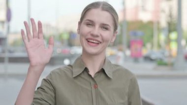 Online Video Chat by Talking Young Woman Outdoor