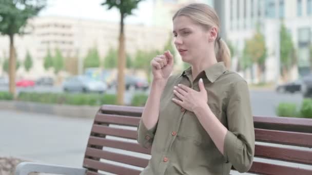 Sick Young Woman Coughing While Sitting Bench Outdoor — Video