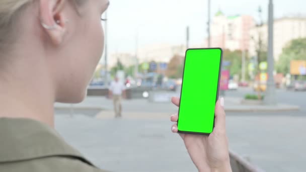 Close Young Woman Using Smartphone Green Screen Outdoor — Stockvideo