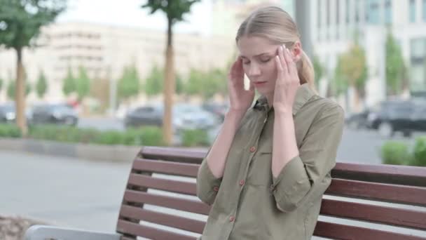 Distressed Young Woman Headache Sitting Outdoor Bench — Vídeo de Stock