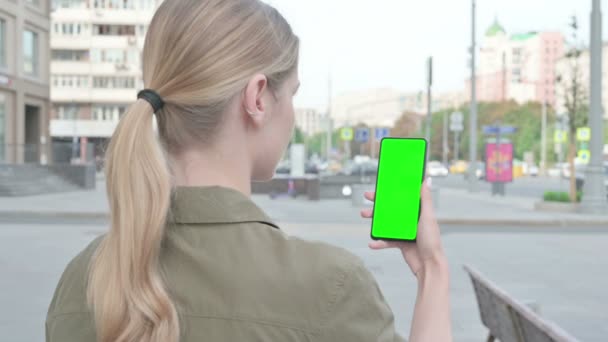 Young Woman Using Smartphone Green Screen Outdoor — 图库视频影像