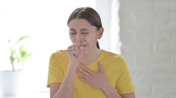 Portrait of Sick Young Woman Coughing