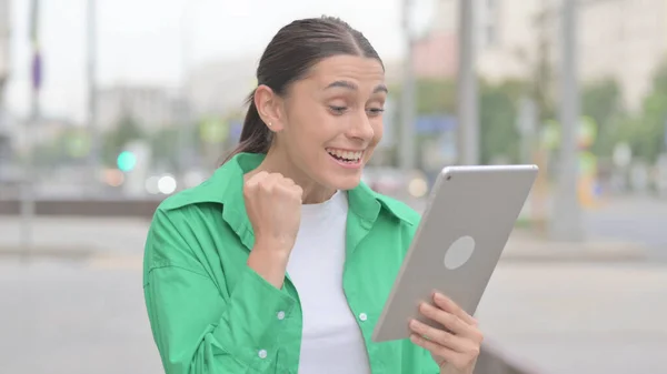 Young Woman Celebrating Success Tablet Outdoor — Stok fotoğraf