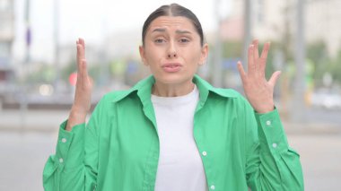 Disappointed Young Woman Reacting to Loss Outdoor